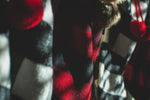 red white and black textile