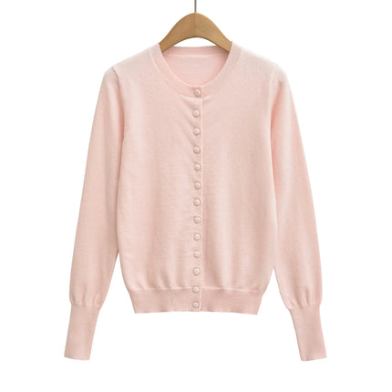 Top holgado de cuello redondo, manga larga y botonadura sencilla - tugranalmacen.com