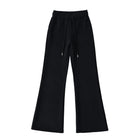 Pantalones anchos de felpa con cintura elástica y cordón ajustable, ligeramente acampanados. - tugranalmacen.com