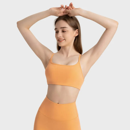 Camisola deportiva con espalda cruzada y escote redondo