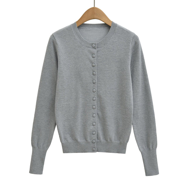 Top holgado de cuello redondo, manga larga y botonadura sencilla - tugranalmacen.com