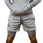 Pantalón corto deportivo gris