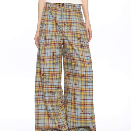Pantalon casual a cuadros de corte holgado para mujer, con diseño amarillo y azul, largo y ligeramente elástico.