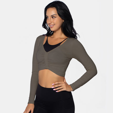 Top corto deportivo de manga larga de mujer. Fseo+fotos