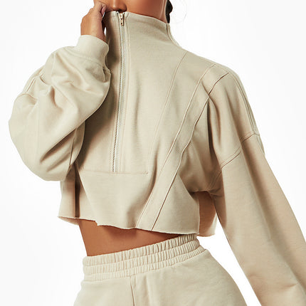 Suéter deportivo de manga larga, holgado, con cuello alto y cremallera, ideal para el gimnasio, entrenamientos y actividades al aire libre.