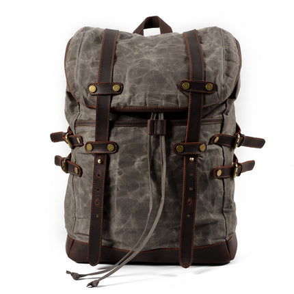 Mochila de lona impermeable para hombre con compartimentos múltiples