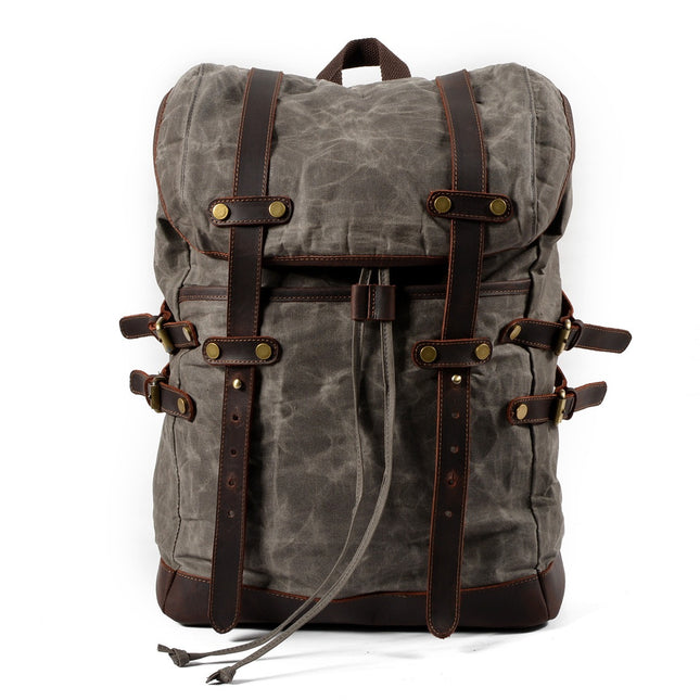 Mochila de lona impermeable para hombre con compartimentos múltiples