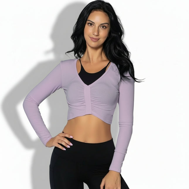 Top corto deportivo de manga larga de mujer. Fseo+fotos