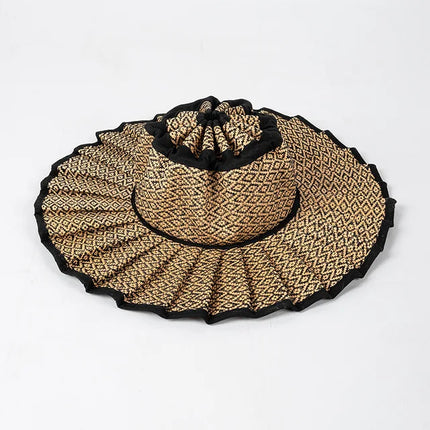 Sombrero de sol ala ancha en fibra vegetal para verano