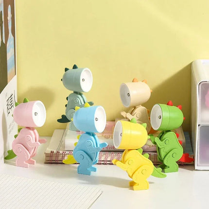 Luz nocturna para niños con diseño de dinosaurio multicolor