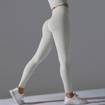 Seamless Solid Peach Sports Trousers for Women - Tight Running Fitness Yoga Pants with High Waist and Butt-Lifting Design - tugranalmacen.com