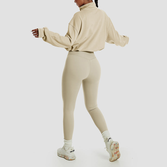 Suéter de manga larga holgado con cuello alto y cremallera para mujer, ideal para correr al aire libre.