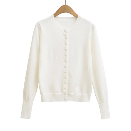 Top holgado de cuello redondo, manga larga y botonadura sencilla - tugranalmacen.com