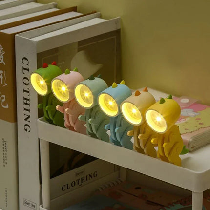 Luz nocturna con diseño de dinosaurio multicolor