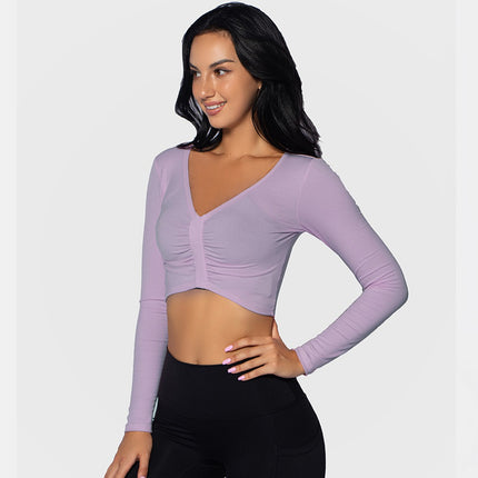 Top corto deportivo de manga larga de mujer. Fseo+fotos