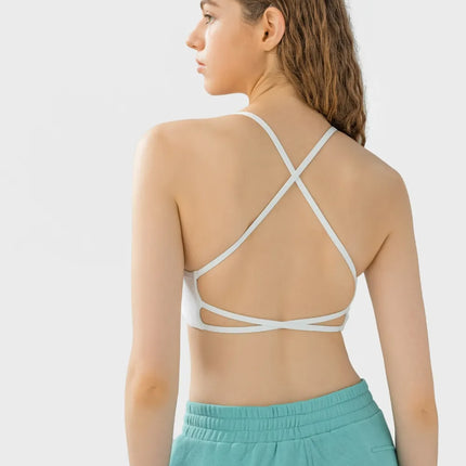 Camisola deportiva con espalda cruzada y escote redondo