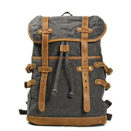 Mochila de lona impermeable para hombre con compartimentos múltiples