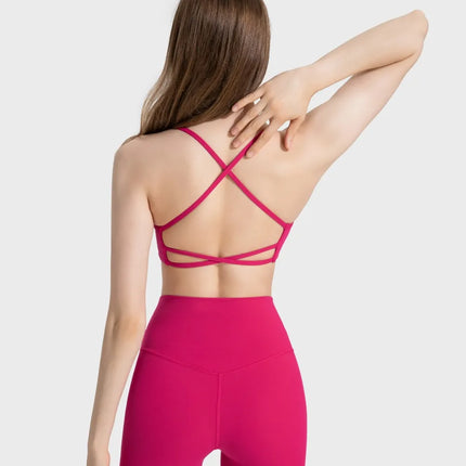 Camisola deportiva con espalda cruzada y escote redondo