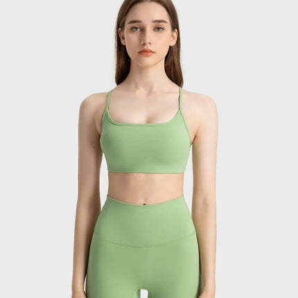 Camisola deportiva con espalda cruzada y escote redondo