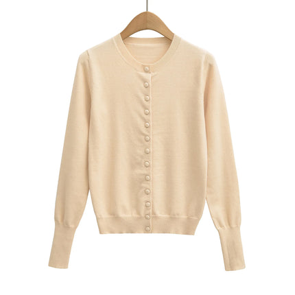 Top holgado de cuello redondo, manga larga y botonadura sencilla - tugranalmacen.com