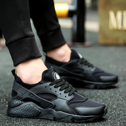 Zapatillas deportivas unisex Flex negras de malla y cuero sintético estilo casual