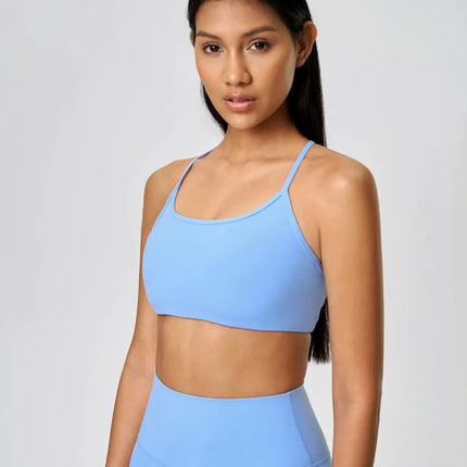 Camisola deportiva con espalda cruzada y escote redondo