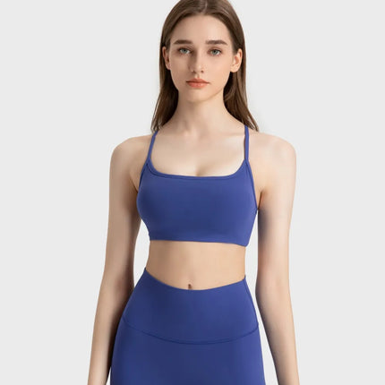 Camisola deportiva con espalda cruzada y escote redondo