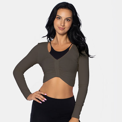 Top corto deportivo de manga larga de mujer. Fseo+fotos