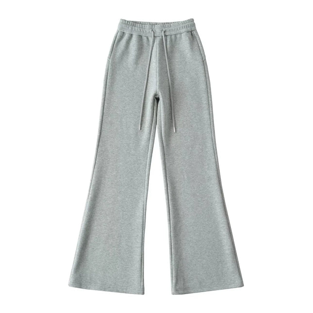 Pantalones anchos de felpa con cintura elástica y cordón ajustable, ligeramente acampanados. - tugranalmacen.com