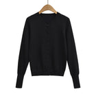 Top holgado de cuello redondo, manga larga y botonadura sencilla - tugranalmacen.com