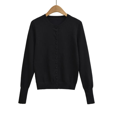 Top holgado de cuello redondo, manga larga y botonadura sencilla - tugranalmacen.com