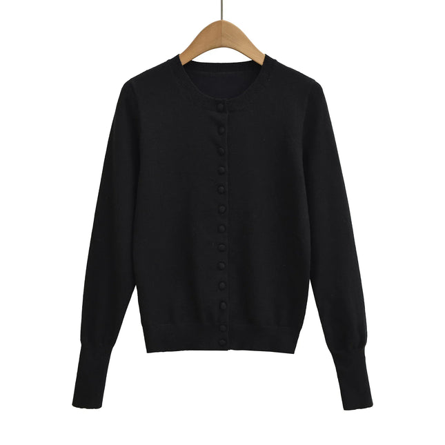 Top holgado de cuello redondo, manga larga y botonadura sencilla - tugranalmacen.com