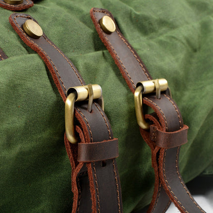 Mochila de lona impermeable para hombre con compartimentos múltiples